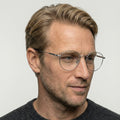 Viridian sølv rund brille på model